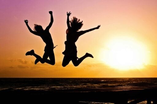 Two Australian expats jumping over excitement