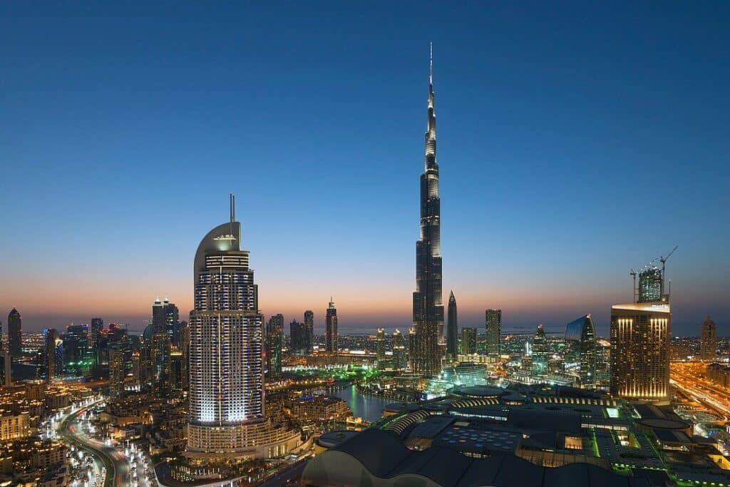71100348 Burj Khalifa the Dubai Mall and skyline of Downtown Dubai at night in United Arab Emirates