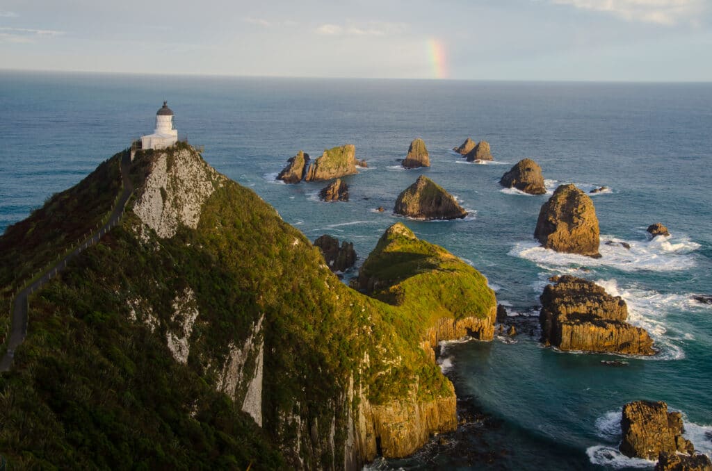 high angle shot nugget point lighthouse new zealand