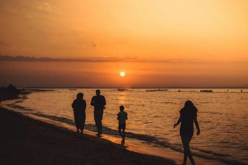 returning expat family in the beach